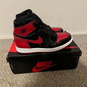 Woman’s Air Jordan 1 patent bred